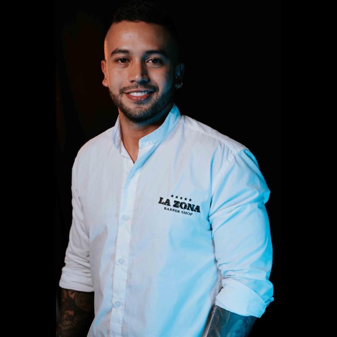 Robert Clavijo, barbero